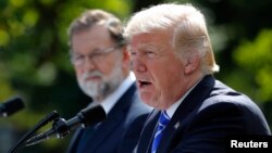 Spanish Prime Minister Mariano Rajoy and U.S. President Donald Trump hold a joint news conference in the Rose Garden at the White House in Washington, Sept. 26, 2017.