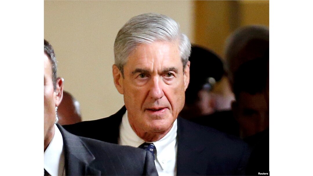 FILE - Special Counsel Robert Mueller departs after briefing members of the U.S. Senate on his investigation into potential collusion between Russia and the Trump campaign on Capitol Hill in Washington.