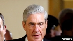 FILE - Special Counsel Robert Mueller on Capitol Hill in Washington.