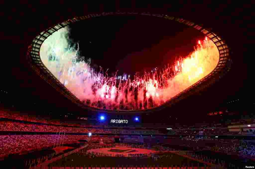 Fireworks explode as a sign that says &quot;Thank You&quot; is displayed at the end of the closing ceremony of the Tokyo 2020 Olympics in Tokyo, Japan.