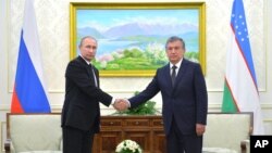 Rusiya prezidenti Vladimir Putin və Özbəkistanın Baş naziri Şovkat Mirziyoyev