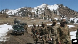 Pakistan army soldiers patrol in the Pakistani tribal area of Ditta Kheil in North Waziristan where the Pakistan army are fighting against militants and al-Qaida activists along the Afghanistan border (File Photo - March 8, 2011)