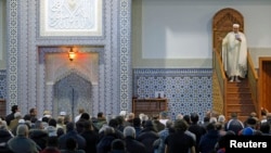Members of the Muslim community attend the Friday prayer at Strasbourg Grand Mosque, one week after the deadly attacks in Paris, France, Nov. 20, 2015.