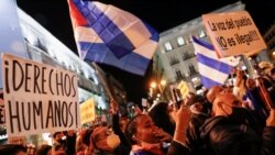 FILE - People take part in a protest to support Cuban dissidents and to demand human rights in Cuba, at Puerta del Sol square in Madrid, Spain, November 15, 2021.