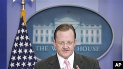 White House Press Secretary Robert Gibbs gestures during his daily news briefing at the White House in Washington, Nov., 30, 2010