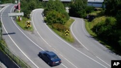 A lone car has it's choice of entry ramps onto highway E-18, usually one of the busiest roads leading into the Norwegian capital, because the onset of vacation time slows Oslo to a relaxed crawl, as seen July 16, 2004. 