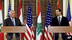 U.S. Secretary of State Rex Tillerson, left, speaks during a press conference with Lebanese Prime Minister Saad Hariri, at the Government House, in downtown Beirut, Lebanon, Thursday, Feb. 15, 2018.