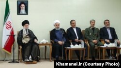 Iranian Supreme Leader Ayatollah Ali Khamenei, far left, meets with President Hassan Rouhani, second from left, and other members of the president’s Cabinet, Aug. 29, 2018.