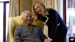Secretary of State Hillary Rodham Clinton meets with former South Africa President Nelson Mandela, 94, at his home in Qunu, South Africa, Aug. 6, 2012.