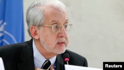 FILE - Independent investigator on war crimes in Syria Paulo Pinheiro addresses U.N. Human Rights Council in Geneva, March 17, 2015. 