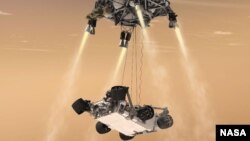 Gambar konsep pendaratan pesawat penjelajah angkasa NASA, Curiousity, ke permukaan planet Mars (NASA/JPL-Caltech). Pesawat ini dijadwalkan akan mendarat di Mars Senin dini hari (6/8) waktu Amerika.