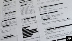 Lois Lerner emails obtained from the House Ways and Means Committee are displayed in Washington, Wednesday, July 30, 2014. 