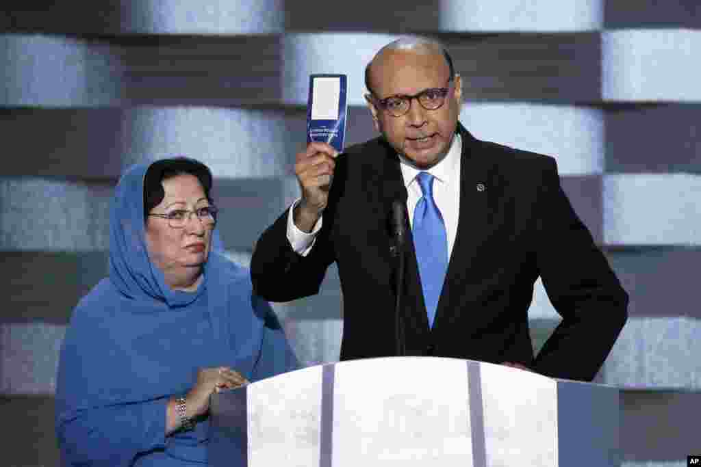 Khizr Khan, father of fallen US Army Capt. Humayun S. M. Khan holds up a copy of the Constitution of the United States as his wife listens during the final day of the Democratic National Convention in Philadelphia, July 28, 2016