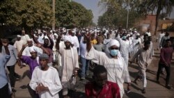 People protest in Khartoum, Sudan, after a military coup earlier this week, Oct. 29, 2021.