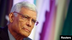 FILE - OPEC secretary-general Abdullah al-Badri listens during a news conference after a meeting of OPEC oil ministers in Vienna, Austria, June 5, 2015. 