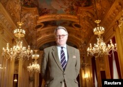 Tobias Richter, Director, poses in the foyer of the Grand Theater in Geneva, Dec. 9, 2011.