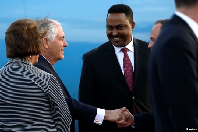 FILE - Former U.S. Secretary of State Rex Tillerson, second from left, and Ethiopia Foreign Minister Workneh Gebeyehu, second from right, meet in Ethiopia.