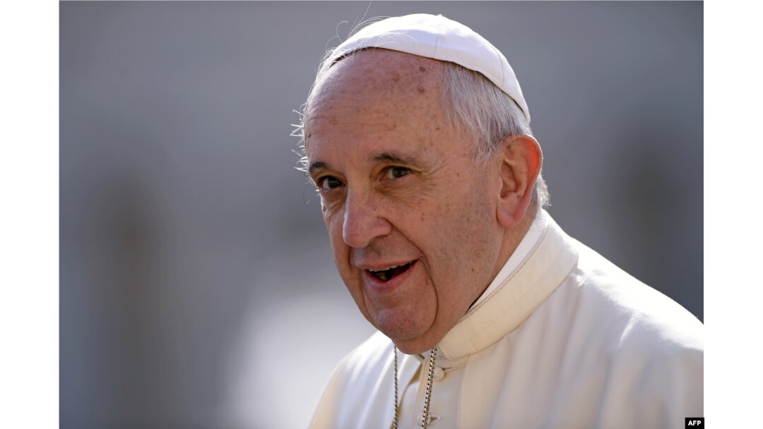 Pope Francis arrives in St Peter's square at the Vatican on Sept. 9, 2015, for his weekly general audience.