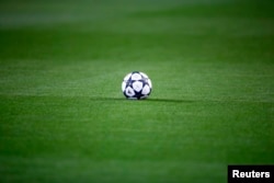 FILE - A soccer ball is seen on the pitch before a kick off.