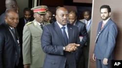 FILE - Democratic Republic of Congo President Joseph Kabila arrives for an African leaders' meeting to discuss the political crisis his country, in Luanda, Angola, Oct. 26, 2016. Tensions in the DRC are running high after a controversial deal extended Kabila's term in office by nearly a year and a half.