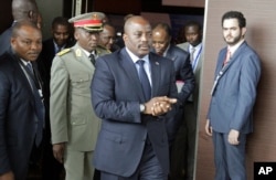 FILE - Democratic Republic of Congo President Joseph Kabila arrives for a southern and central African leaders' meeting to discuss the political crisis his country, in Luanda, Angola, Oct. 26, 2016.