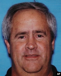 This undated handout photo provided by the U.S. Attorney's Office for the Eastern District of California shows Michael Carey Clemans, 57, who was sentenced to life in federal prison Jan. 23, 2018, for child sex crimes.
