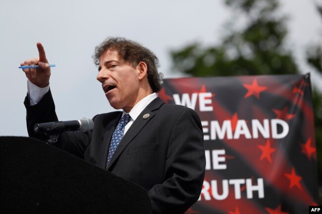 Rep. Jamie Raskin, D-Md., speaks to demonstrators gathered near the Washington Monument during the "March for Truth," June 3, 2017, in Washington, D.C.