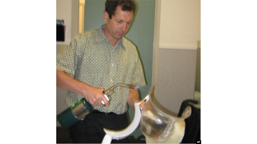 Jon Batzdorff shapes a prosthesis to ensure a perfect fit