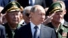 Putin Accuses NATO of 'Aggressive Actions' and 'Rhetoric'