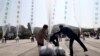 FILE - North Korean defectors prepare to release balloons carrying leaflets condemning North Korean leader Kim Jong Un and his government's policies, in Paju, near the border with North Korea, South Korea, Oct. 10, 2014. 