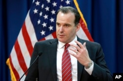 FILE - Brett McGurk, the U.S. envoy for the global coalition against IS, speaks during a press conference at the U.S. Embassy Baghdad, Iraq, June 7, 2017.