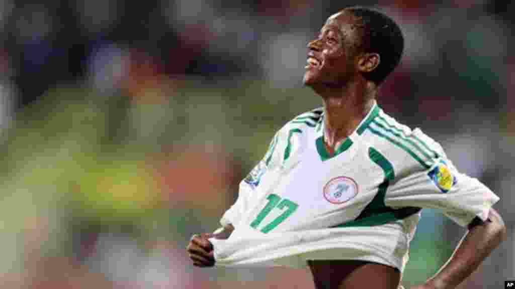 Chidera Ezeh of Nigeria celebrates after scoring a goal against Sweden during a semifinal match of the World Cup U-17 in Dubai.