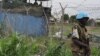 A U.N. peacekeeper stands guard at the U.N. Mission in South Sudan (UNMISS) base in Malakal, where a South Sudanese army soldier reportedly opened fire on Thursday, May 28, 2015.