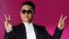 South Korean rapper PSY poses during a news conference for his concert "Happening" in Seoul, South Korea, April 13, 2013.