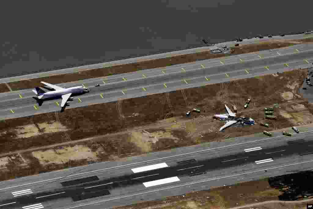 This aerial photo shows the crash site of Asiana Flight 214 at the San Francisco International Airport in San Francisco, July 6, 2013.