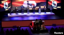 FILE - Uganda's presidential candidates take part in a presidential debate in Uganda's capital Kampala, Jan. 15, 2016, ahead of the Feb. 18 presidential election. Incumbent President Yoweri Museveni did not attend the debate.