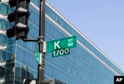 FILE - Known as a center for lobbyists, lawyers, and think tanks, the K Street corridor is seen in northwest Washington at 18th Street, May 3, 2018.