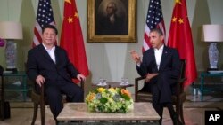 Kineski i američki predsednik, Ši Đinping i Barak Obama, tokom susreta na imanju Sanilends blizu Los Anđelesa