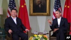 Le président Barack Obama (à dr.) et son homologue chinois ont abordé toute une gamme de questions, dont le cyberespionnage