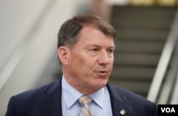 FILE - Sen. Mike Rounds, R-S.D., speaks on Capitol Hill, May 17, 2018.