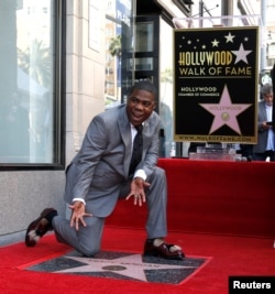 Actor Tracy Morgan poses on his star after it was unveiled on the Hollywood Walk of Fame in Los Angeles, California, April10, 2018.