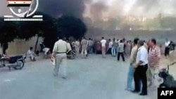 Hama sokaklarını dumanlarla kaplı olduğunu gösteren Amatör video görüntüleri