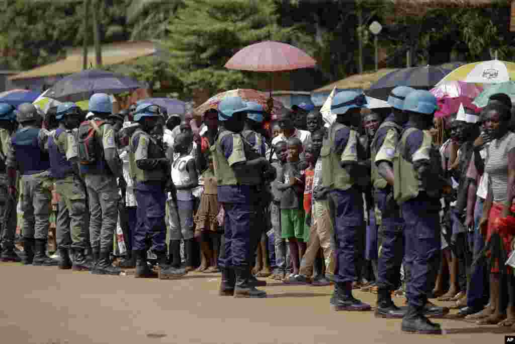 U.N. peacekeeping soldiers patrol the streets prior to the arrival of Pope Francis to visit a refugee camp, in Bangui.