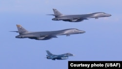 Two U.S. Air Force B-1B Lancers fly from Andersen Air Force Base, Guam, into Japanese airspace and over the Korean Peninsula, July 30, 2017. The B-1s made contact with Japan Air Self-Defense Force F-2 fighter jets in Japanese airspace, then proceeded over the Korean Peninsula and were joined by South Korean F-15 fighter jets. This mission is in direct response to North Korea’s escalatory launch of intercontinental ballistic missiles, July 3 and 28.