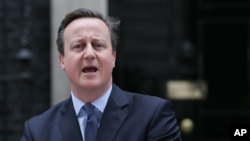 British Prime Minister David Cameron makes a statement outside 10 Downing Street in London, Feb. 20, 2016. 