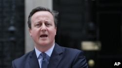 英國首相卡梅倫星期六在唐寧街10號官邸外宣布，今年6月23日將進行英國是否繼續保持歐盟身份的全民公決。