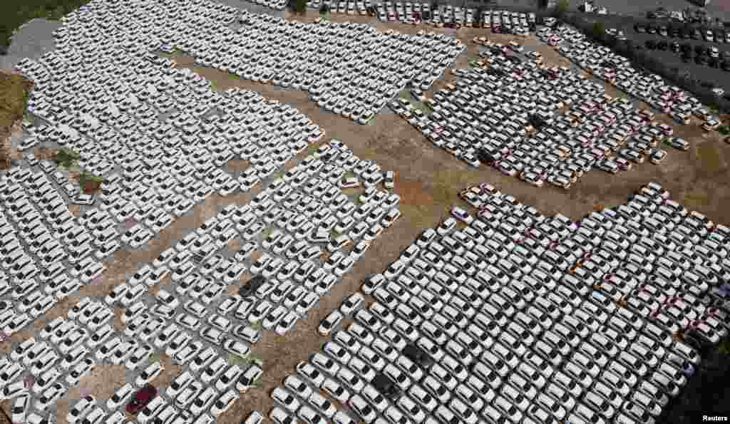 Car-sharing vehicles are seen at a parking lot during the COVID-19 outbreak, near Moscow, Russia, May 20, 2020.