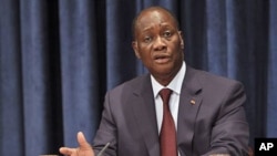 Alassane Ouattara dans un point de presse à l'ONU le 27 juillet 2011