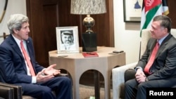 U.S. Secretary of State John Kerry with Jordan's King Abdullah in Amman, Jan. 5, 2014, suggested Iran could contribute to Syria peace talks "from the sidelines." 