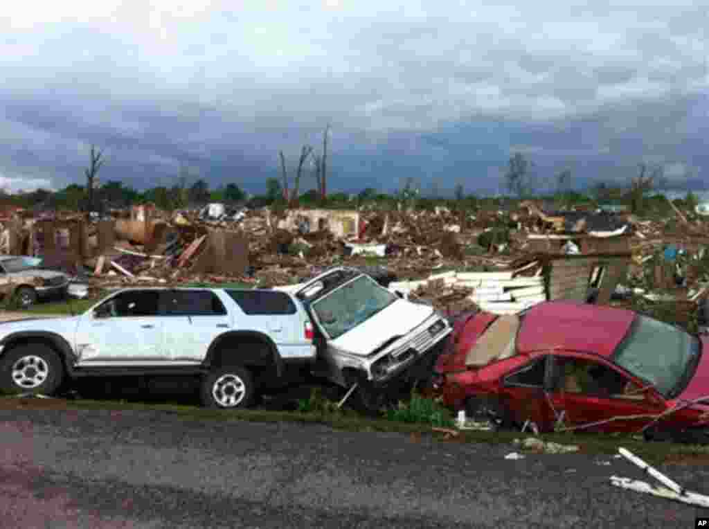 A tornado has flattened Pleasant Grove, Ala., a subdivision of Mountain Grove, Thursday, April 28. 2011. Dozens of tornadoes spawned by a powerful storm system wiped out entire towns across a wide swath of the South, killing at least 194 people, and offic